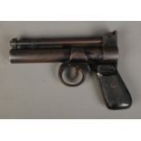 A Webley & Scott The Webley Junior .177 calibre air pistol featuring chequered grips. CANNOT POST