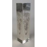A Charles Rennie Mackintosh pewter vase of square form featuring bunch of flowers to each side.