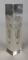 A Charles Rennie Mackintosh pewter vase of square form featuring bunch of flowers to each side.