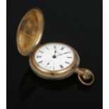 A yellow metal full hunter pocket watch, with engine turned detail and face stamped for America,