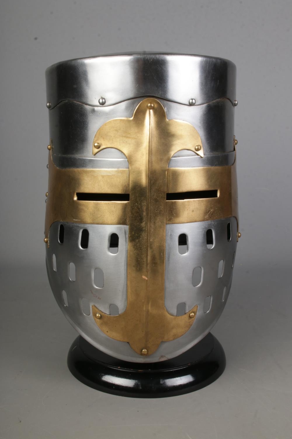 A replica medieval helmet on black display stand, life size model. - Image 2 of 2