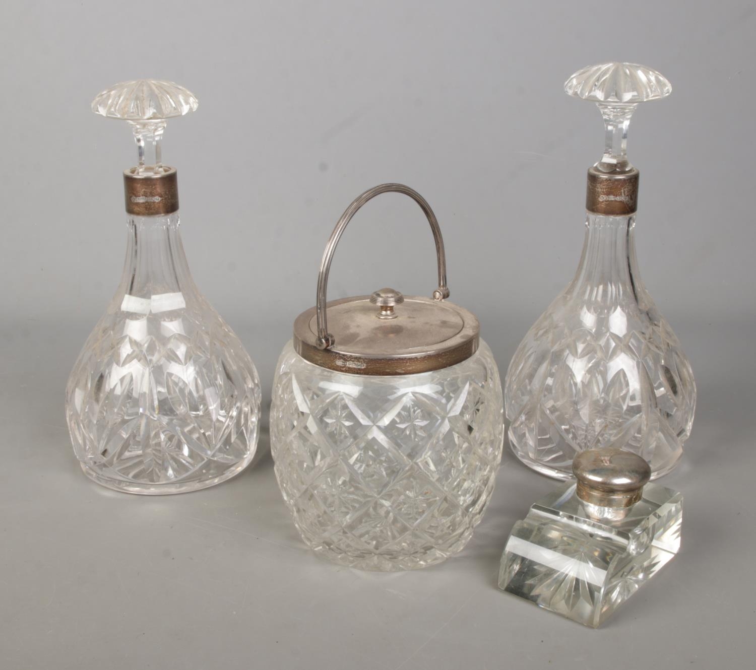 Four pieces of silver mounted glassware, to include three piece Joseph Rodgers & Sons decanter and