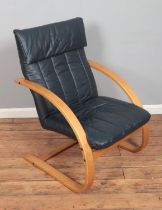 A modern Danish leatherette reclining chair.