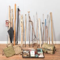 A large quantity of vintage sporting equipment, mainly fishing. To include two and three piece rods,