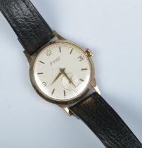A gents 9ct gold Accurist manual wristwatch. Having subsidiary seconds and baton and Arabic