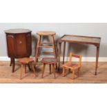 A collection of assorted furniture, to include drinks side table, Hayes folding table, kitchen stool