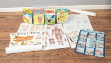 A box of assorted children's annuals such as Beano and Topper along with selection of educational