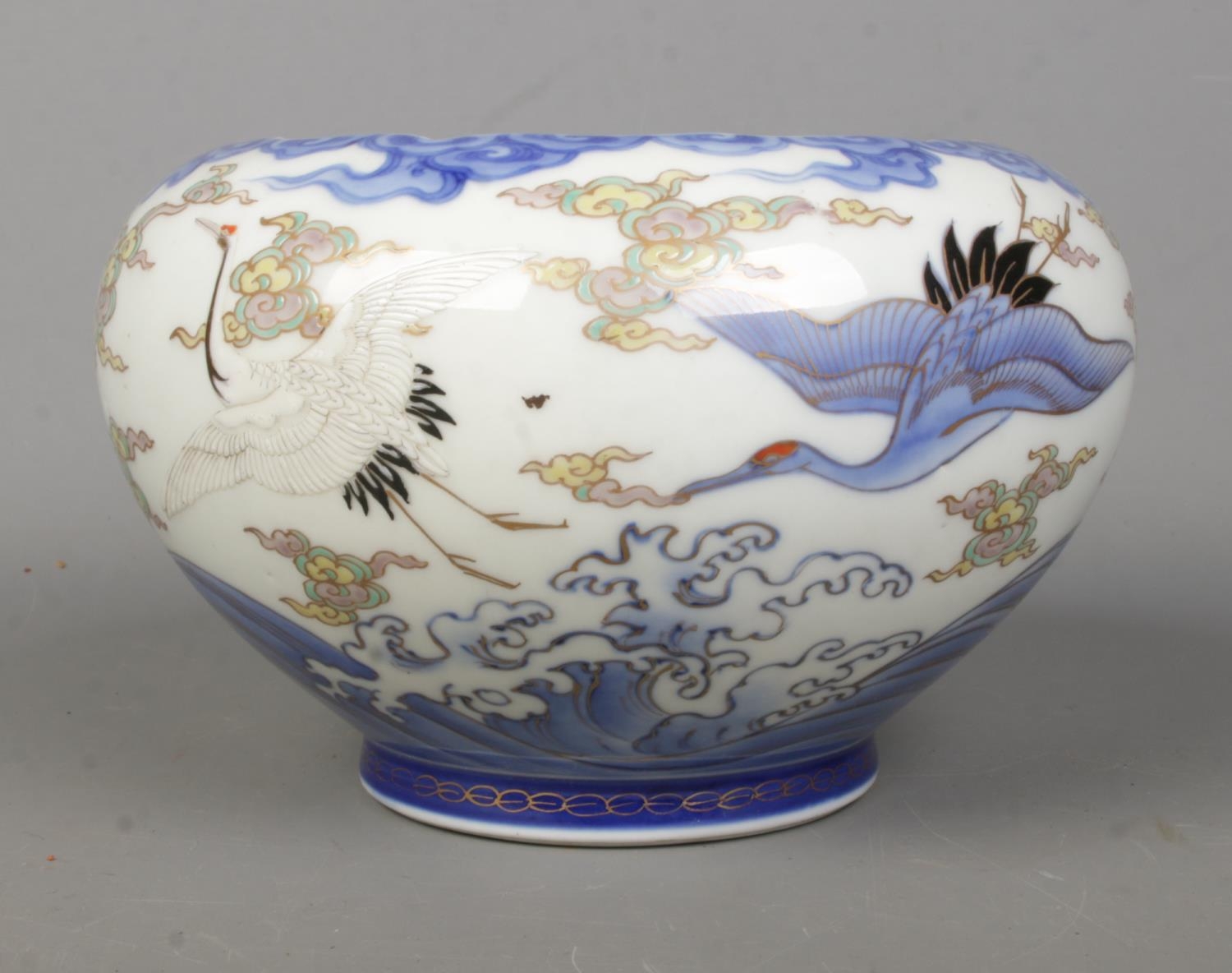 A Twentieth Century oriental bowl, with blue and white underglaze and gilt highlights, depicting - Image 2 of 3