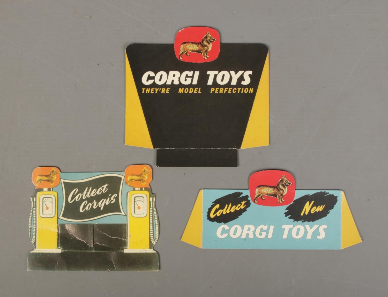 Three original Corgi Toys promotional display cards to include 'Collect New Corgi Toys', 'Collect