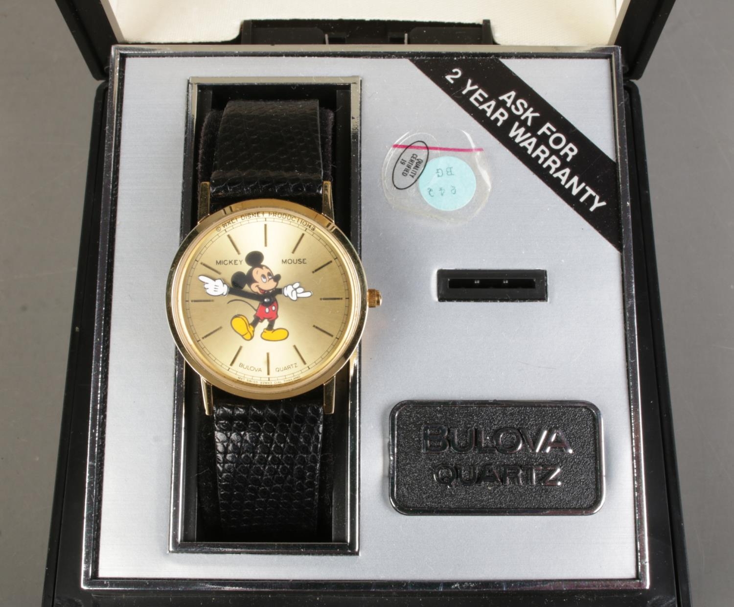 A boxed Bulova Mickey Mouse quartz wristwatch, on black 'Genuine Lizard' strap. With owner's guide - Image 2 of 4