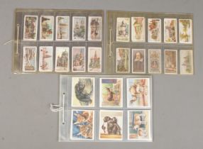 Three sets of cigarette cards in sleeves. Includes Will's Gems of Russian Architecture (complete),
