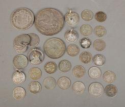 A quantity of pre 1947 silver coinage. To include 1935 crown, 1907 half crown and several examples