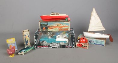A collection of vintage toys, to include Tri-ang 8" Lugsail Dinghy and Ladybird, Leghorn Lucy and