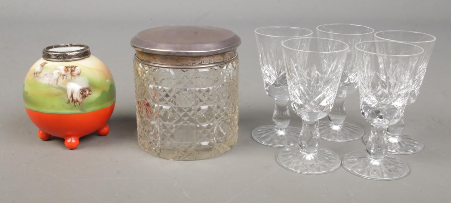 A silver lidded cut glass jar along with silver rimmed Royal Bayreuth vase and five cut glass sherry