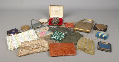 A collection of vintage evening bags, purses and powder compacts, including Melissa and Stratton