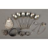 A collection of assorted silver, to include 2 filigree peacock brooch, rings and a set of six