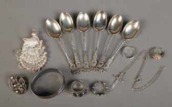 A collection of assorted silver, to include 2 filigree peacock brooch, rings and a set of six