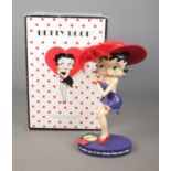 A boxed Westland Betty Boop figure: "It's not the age, it's the attitude. Boop-oop-a-doop!".