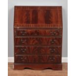 A mahogany four drawer bureau, with drop down desk revealing partially fitted interior. Height: