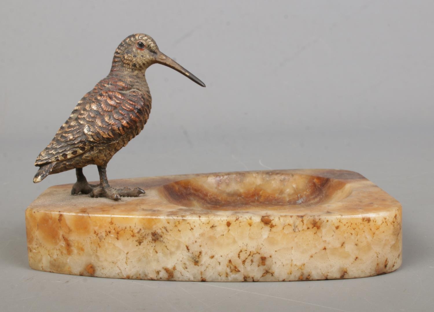 A cold painted bronze woodcock mounted on an onyx pin tray. 12cm long. - Image 2 of 2