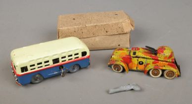 Two Japanese tinplate toys to include Tank and boxed bus marked 'Made in Occupied Japan' to