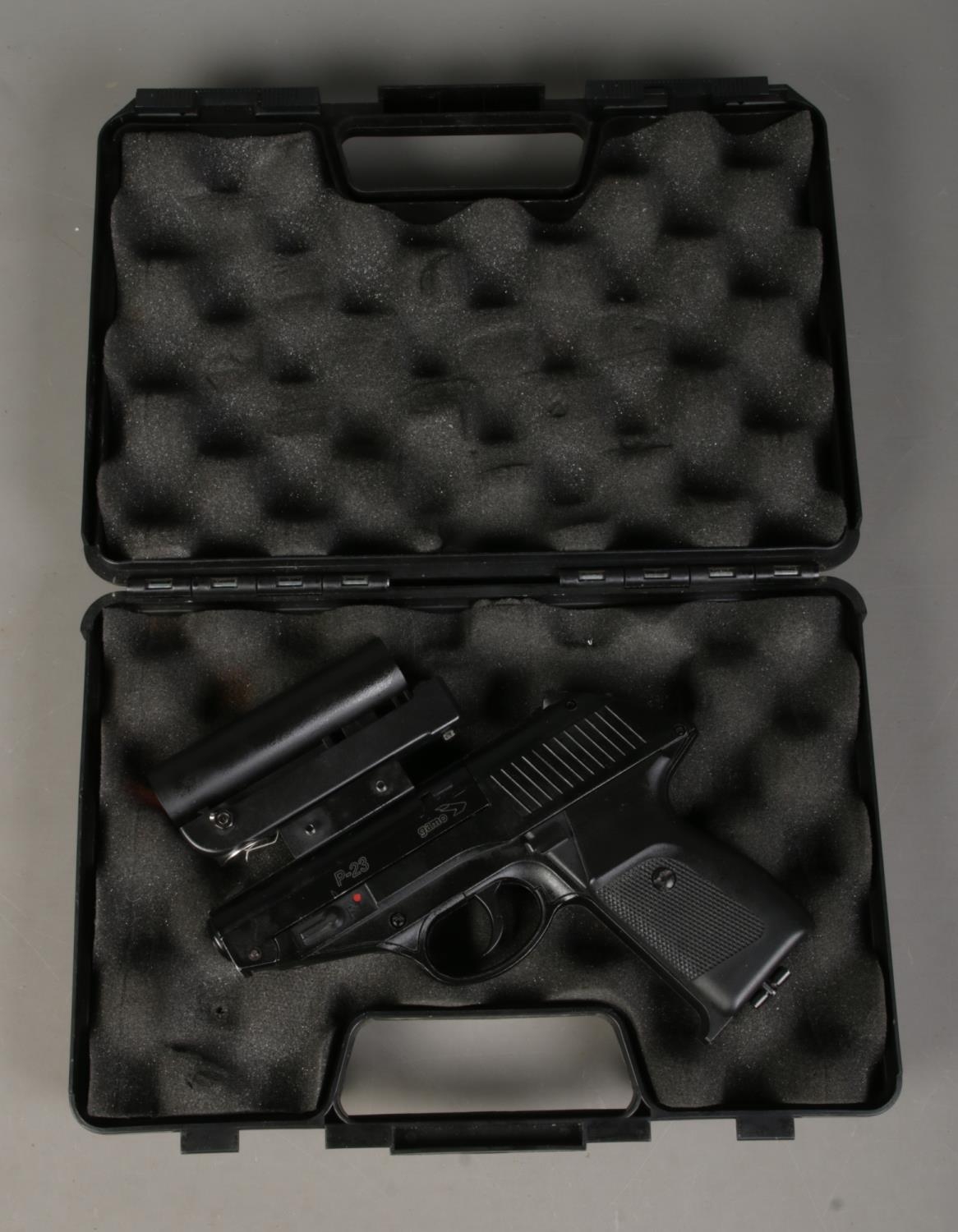 A Gamo P-23 CO2 air pistols in case fitted with telescopic sight. CANNOT POST OVERSEAS