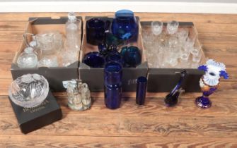 Three boxes of glassware. Includes decorative blue glass items, decanters, boxed Bohemia crystal