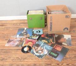 One box and one carry case of vinyl records and singles of mainly pop and easy listening to