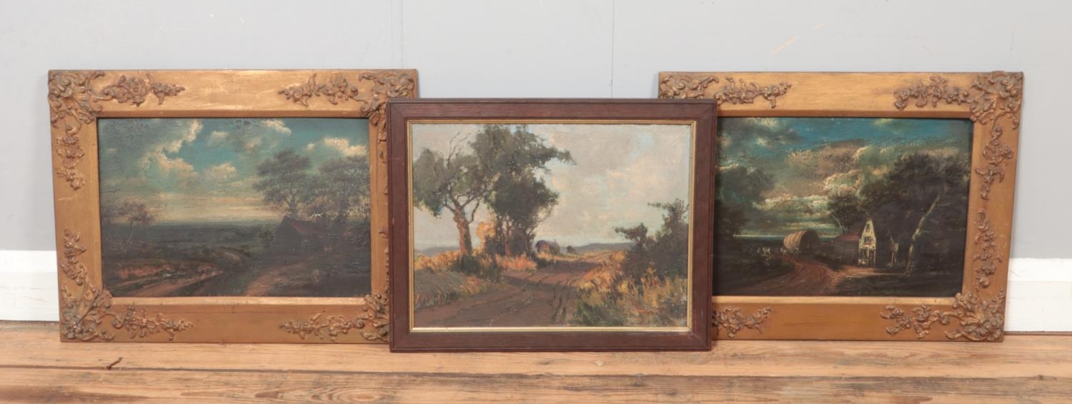 Three framed amateur oil on paintings of countryside scenes, one signed by J Cameron.