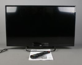 A JVC LT-32C490 32" LED HD TV, with remote and booklet.