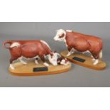 Two Beswick Connoisseur models; Hereford Bull and Hereford Cow and Calf.