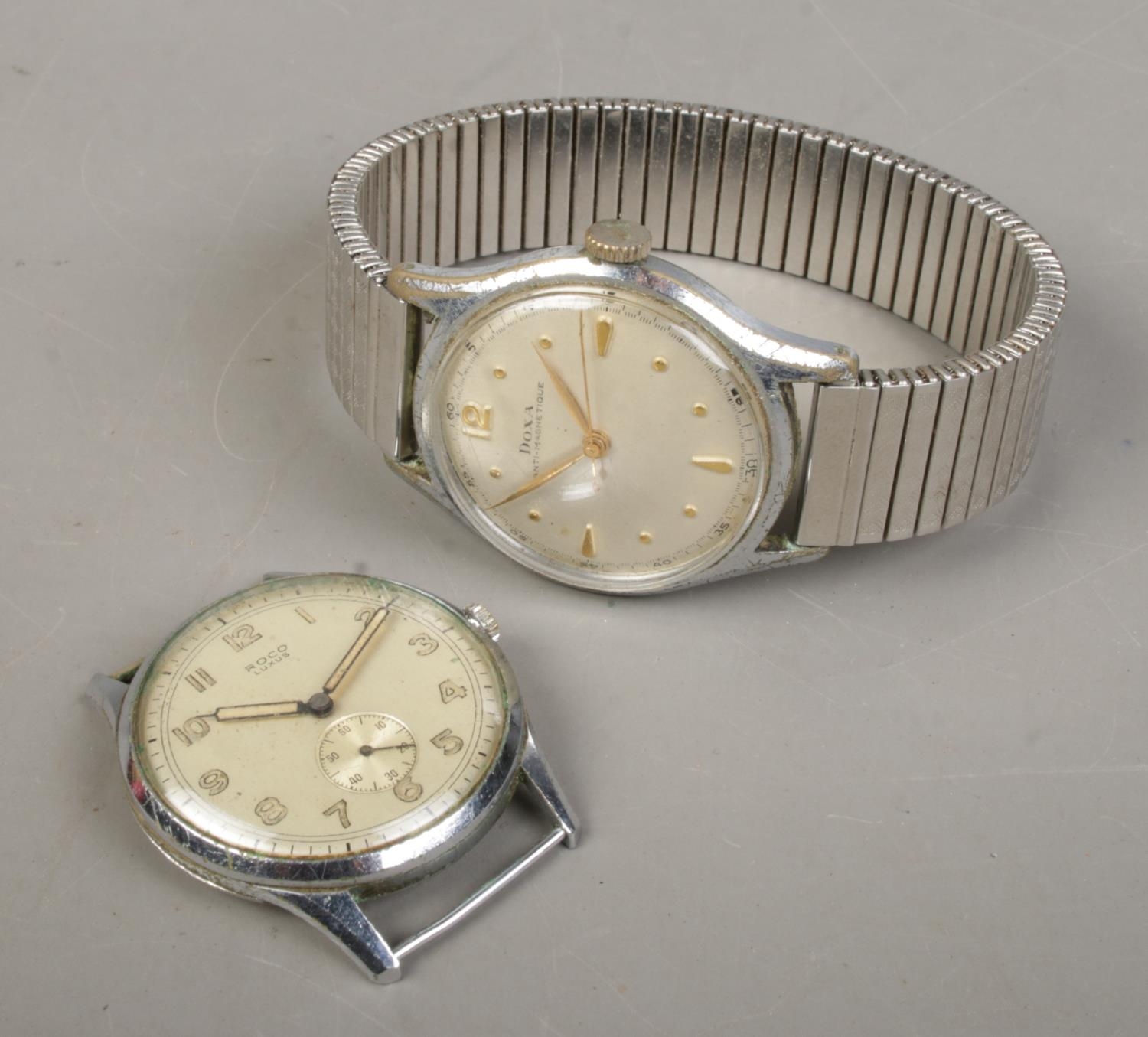 Two gents vintage manual watches. Includes Doxa and Roco watch head.