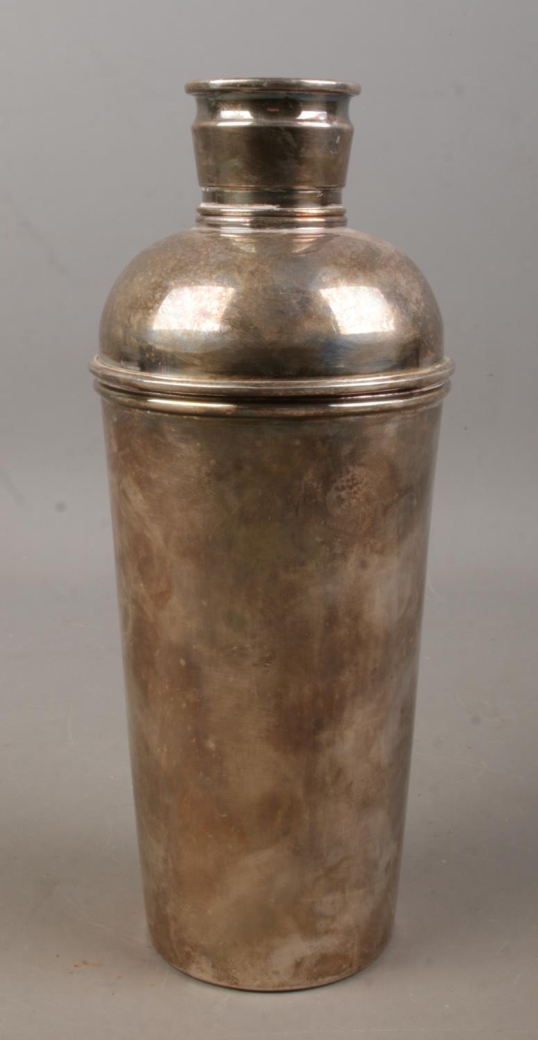 A silver plated cocktail shaker by Charles S Green & Co.