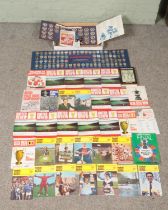 A collection of vintage sports memorabilia, to include Esso Football Club badges, Top Team