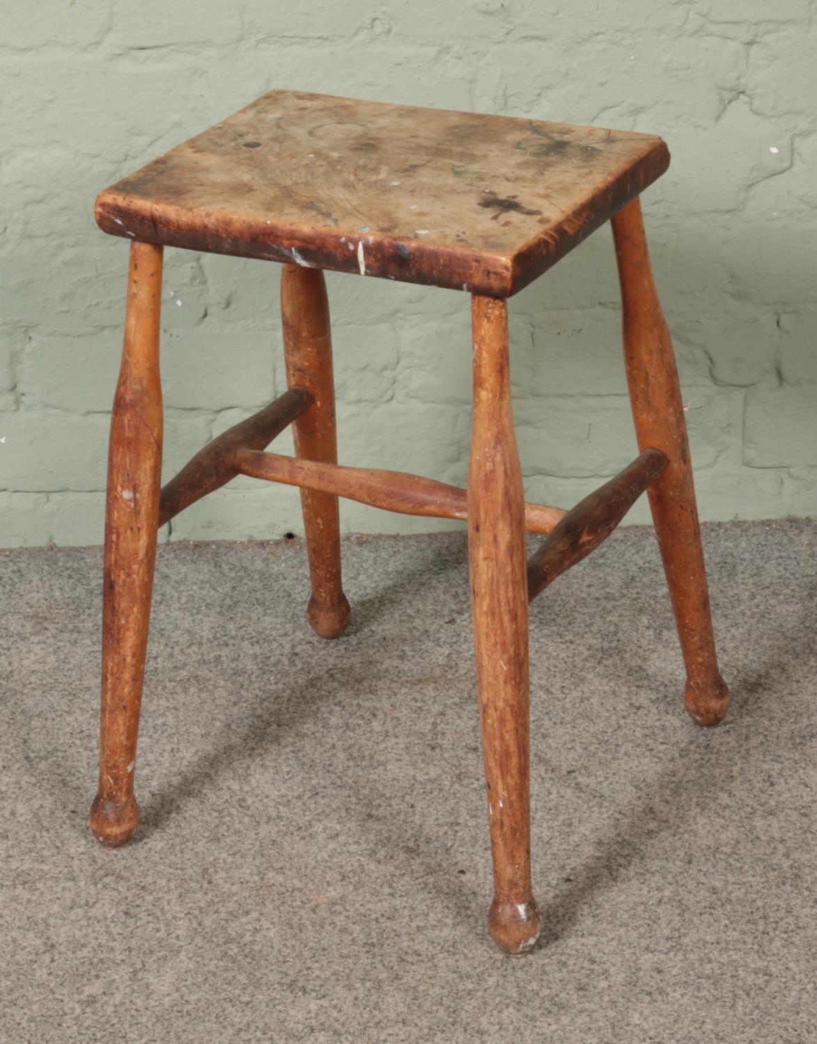 A antique hardwood stool.
