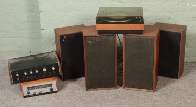 A Beogram record player with two pairs of speakers including Wharfedale and Sharp examples