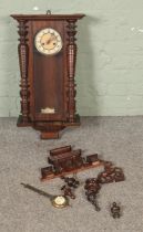 A mahogany case wall clocks with brass pendulum with pot inset marked R-A. some parts missing or not