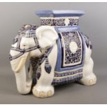 A large Oriental ceramic jardiniere formed as an elephant, decorated in blue and white. Length:
