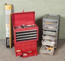 Two metal and one other tool drawers with contents along with a Tooltec folding workbench and