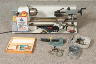 A Conquest Lathe by Chester UK with variable speed and 7" diameter swing. Also includes small