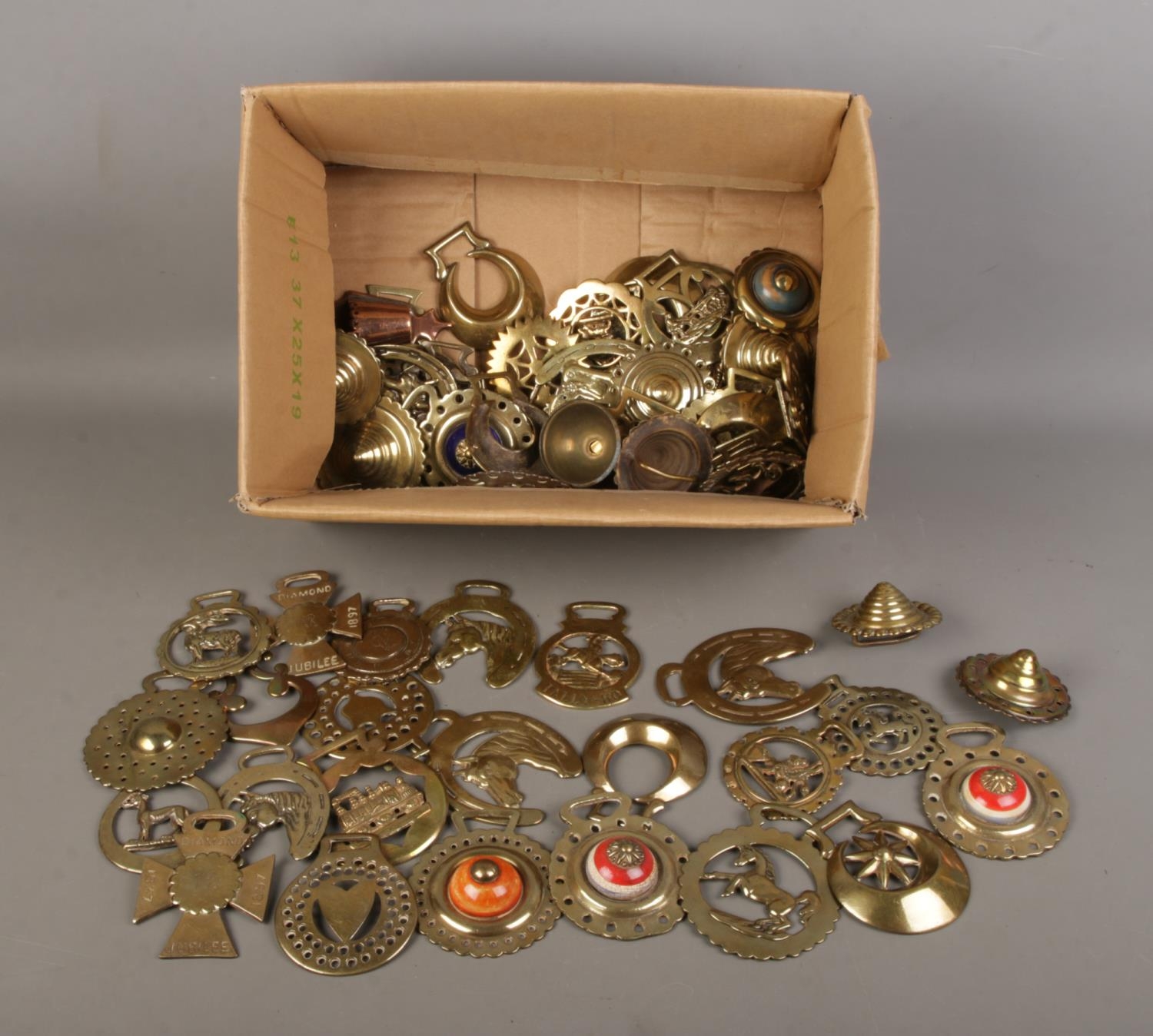 A good collection of assorted horse brasses to include Queen Victoria's diamond jubilee,