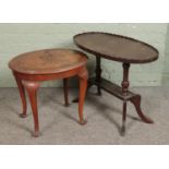 Two small occasional tables including a walnut quarter fold top example