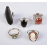 A collection mostly silver rings to include polished gemstone, cluster and cameo examples.