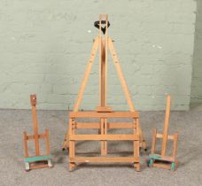 Four wooden Artist's easels, including Reeves example.