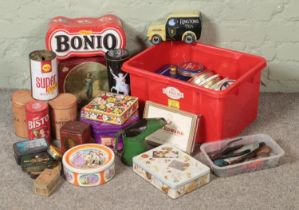 A large collection of tin containers including Shell, Bisto Mac Baren, Will's Cigars, Gallaher's,
