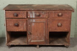 A 19th century farmhouse style pine sideboard. Hx81cm Wx129cm Dx54cm Missing two drawers, used in