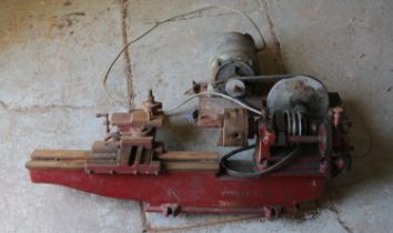 A vintage Winfield metal working lathe.
