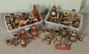 A large quantity of metalwares including brass teapots, candlesticks, jugs, horse brasses,