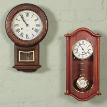 Two modern wall clocks including a President 31 day Victoria example