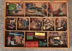 A wooden case containing a collection of mainly vintage lead figures, including Britains and